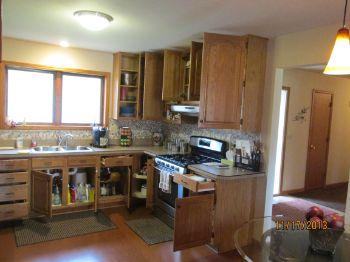 Kitchens typically include a stove,
