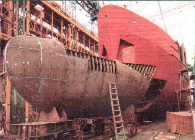includes fabrication and installation of bulbous bow,