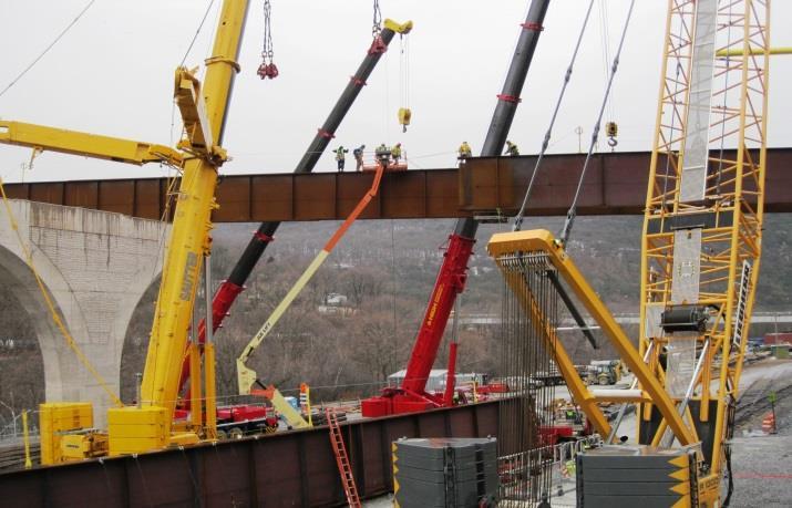 construction live load effects during erection of the superstructure were limited to splice cages, weight of tools and Ironworkers.