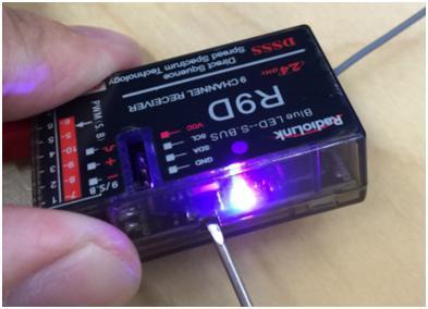 Press the switch inside the receiver twice with small screwdrivers to make LED indicator turns PURPLE to set the control mode to