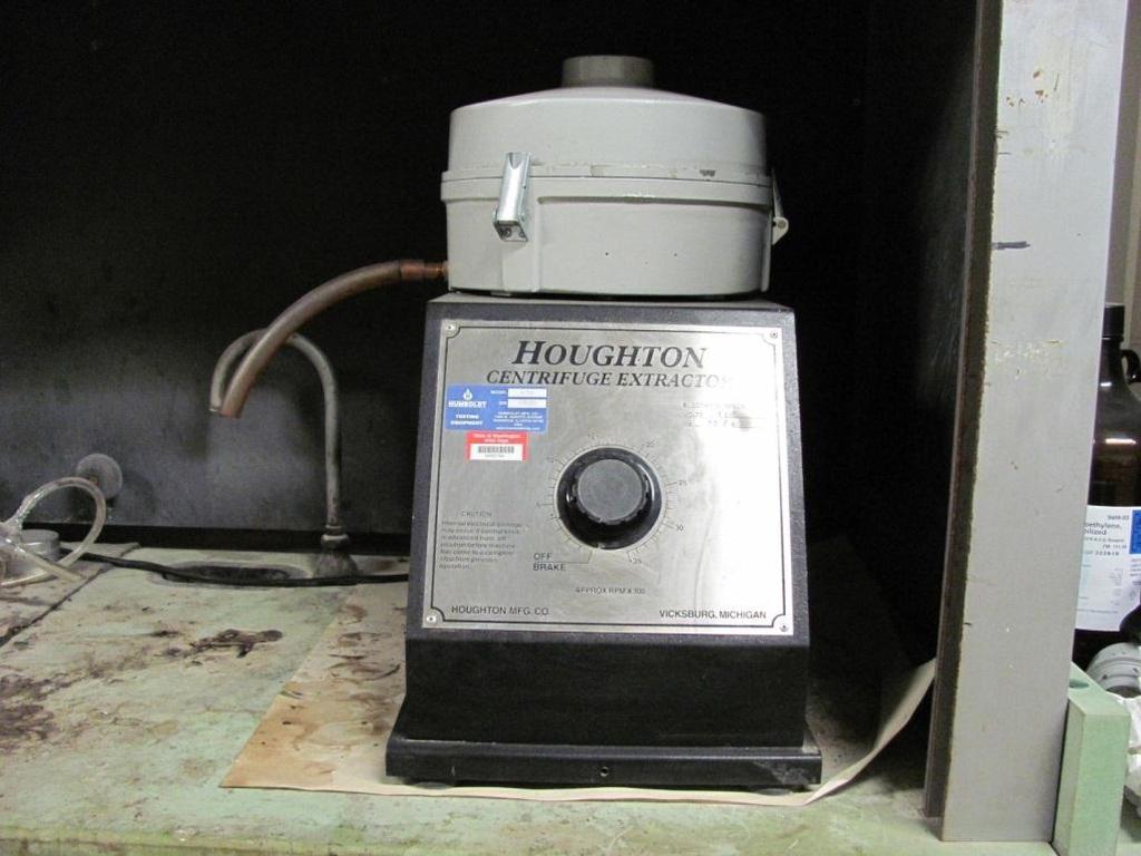 Figure 4-7. Centrifuge Used for Asphalt Extraction Once the mix samples were broken down, approximately 500 grams of the aggregate and binder pieces were placed in the bowl of the extractor.