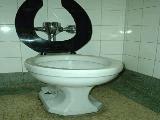 should be replaced. Urinals are not cracked or corroded. Wash fountain has been replaced. Toilet is worn and outdated.