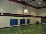 The single gymnasium is approximately 5.8 metres high and does meet the specified height requirement.