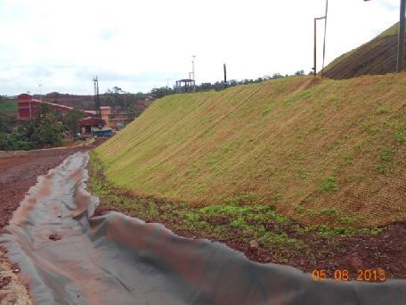 Photo 18 - Showing dump stabilization with provision of the retaining wall followed by garland drain at the toe of the dumps SPECIFIC CONDITION 20 Plantation shall be raised in an area of 225.