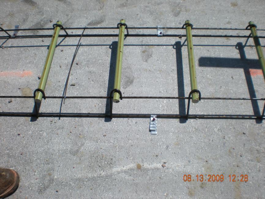 Load Transfer Dowel basket placement t 7 Securely anchored Variable