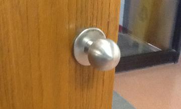 hardware at classroom doors Door knobs are noncompliant and
