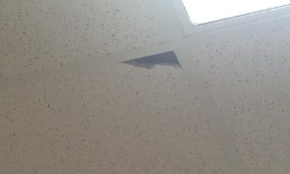 indicate a leak above ceiling; tiles should be