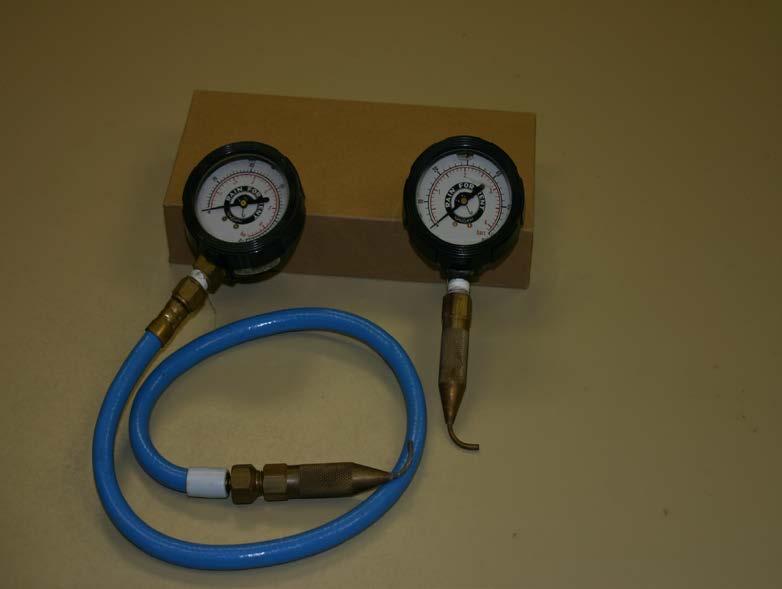 Pressure gauge with Pitot tube attached