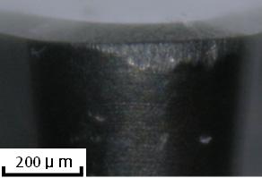 This is attributed to the existence of inclusion particle and pores in the thermal spray coating, and subsequently contributed to the mechanical effect on the tool wear.