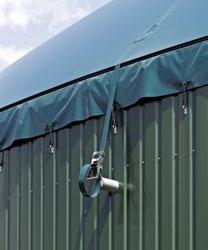These two sheets are attached to the container wall in a U-shaped sheet clamping track by