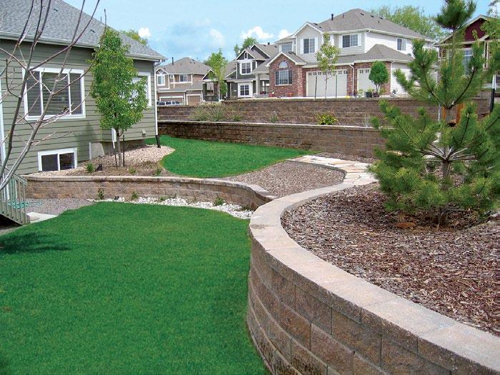 More than Just Landscape Walls Beyond structural walls, your property can be enhanced using simple landscape wall designs.