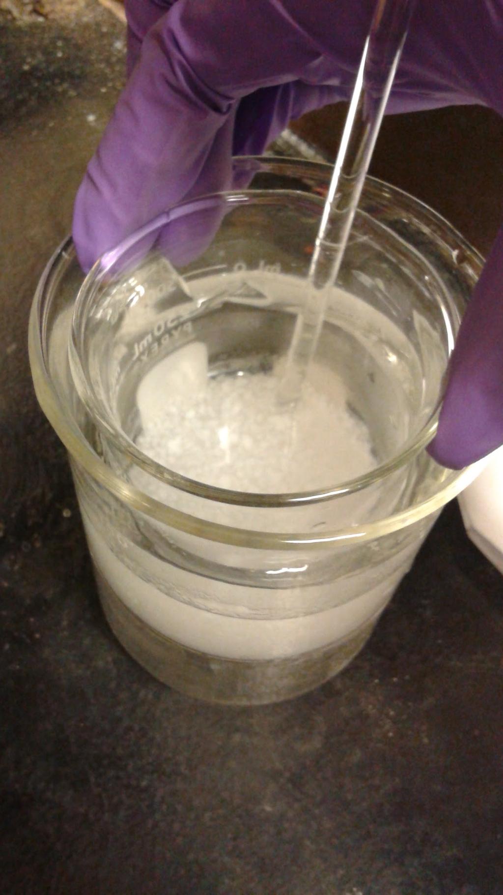 Figure 8 12. Warm the solution at low temp and continue to stir until the Al(OH) 3 is completely dissolved in the solution. a. This solution now contains potassium ions (from the KOH), aluminum ions, and sulfate ions.