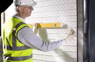 The system comprises a rigid phenolic insulation panel which Hanson prebonds to a brickwork co-ordinating carrier sheet.
