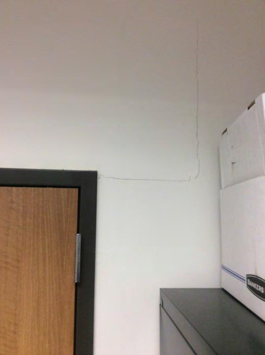crack above door head - 3'.