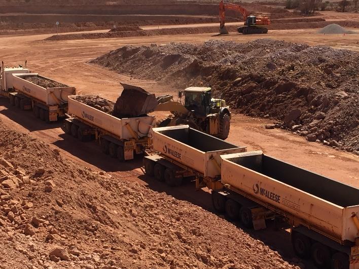 A B C Management Comment Figure 3A to D ROM Stockpile and Ore Haulage Genesis Managing Director Michael Fowler said the open pit mining operation at Ulysses West was making excellent