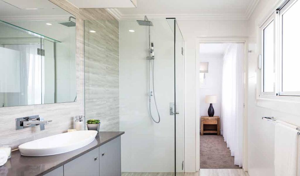 MIRRORS 6 FREESTANDING BATH TO ENSUITE 7 ALUMINIUM SHOWER GRATES TO SHOWERS INCLUSIONS (NOT SHOWN): STYLUS DORADO BTW TOILET SUITE WITH