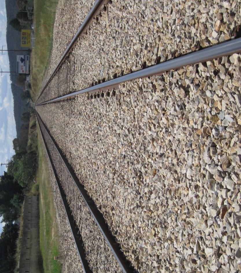 BALLAST Used as Rail Ballast (see picture below); placed between and under the ties of a