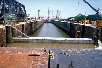 Aging Lock Inventory* Age in 2004 (Years) 0-10 5 11-20 20 21-30 31-40 41-50 51-60 61-70 13 19 36 49 53 Dewatering and repairs of Inner Harbor Lock, New Orleans, which