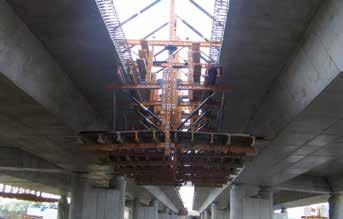 CVI under concrete structure Deck flange form carrier Efficient system for casting deck flanges of metal bridges and partially