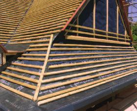 To reduce wind uplift on the roof covering. As a temporary protection layer before the roof covering is applied.