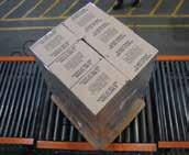 systems eliminate the need to rotate the pallet being stretch wrapped.