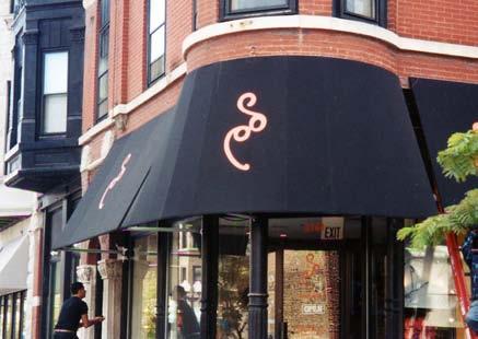 The length of the sign shall not exceed the width of the enframed storefront. Wall signs shall be placed within a clear signable area, the area relating to the pattern of the façade.