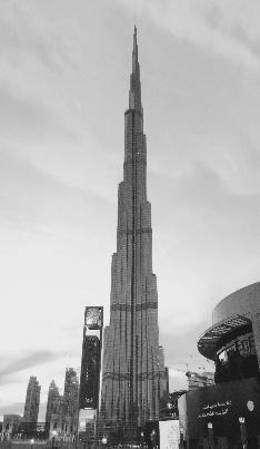 9. The lift in the world s tallest building takes 64 s to reach a height of 828 m. The maximum mass of the lift and passengers is 900 kg. a. Calculate the power of the lift.