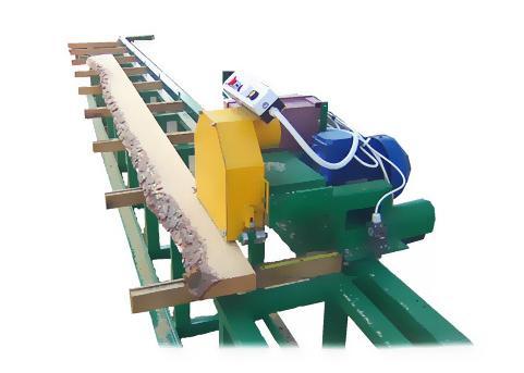 Principle of operation of the machine is based on the cutting of stationary set board on a table by a moving carriage.