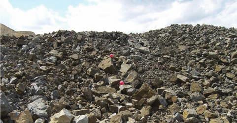 The rock piles from the blasting tests at Goltas cement factory clay quarry are shown in Figure 4 and Figure 5. The scales the two photographs are equal, as shown by the average size of the red balls.
