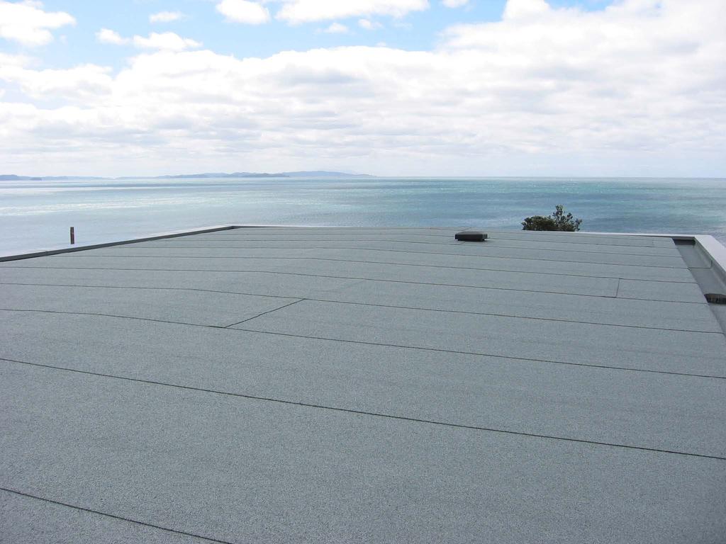 They are installed as a multi-layer system with either a mineral chip finished product or a UV protective paint as the top layer or as a single layer system onto a concrete substrate under heavy