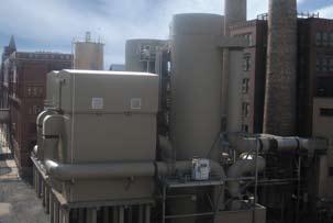 electrostatic precipitator system to control SO 2 and particulate from a container glass furnace.