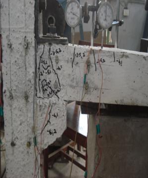 This was because the precast concrete connections had predetermined crack locations at the beam column interface because of imposed cold joints. Figure 4.1(a), 4.1(b) and 4.