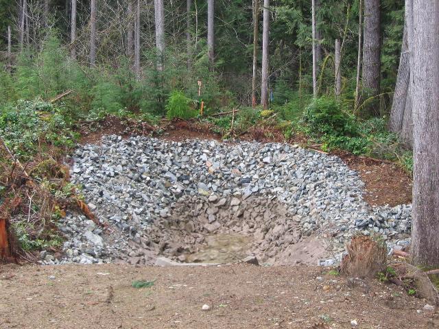 Mitigation Rock pits promote infiltration of ditch