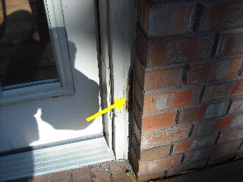 garage door trim Materials: brick vinyl holes present small