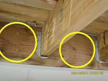 Consider installing lag screws to securely attach ledger board to house, if they have not been used.