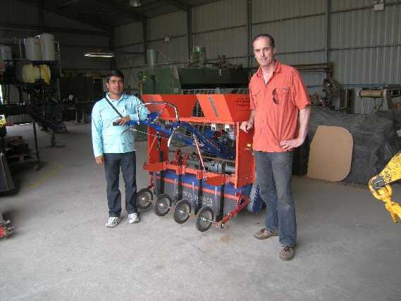 Eng. R. & D. and associated environmental matters. Here is Jack with Matin posing in front of the 2WT fitted with a modified 2BG-6A rotary seed drill.