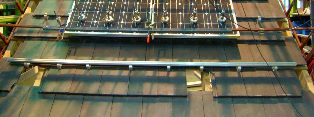 to give equivalent or conservative results). The tests are carried out on a simulated roof structure comprising rafters at a roof pitch of 45º.