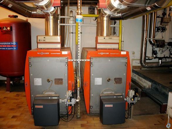 ground-coupled thermal heat pumps each 35 kw therm and 2 gas boilers (2x80 kw