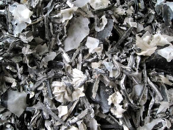 Thin-walled aluminum-profile scrap with rubber or