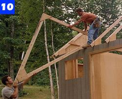 Carefully slide the roof trusses onto the walls. Space them 24 in. on centre and secure them with 3-in. screws. Cover the trusses with 1/2-in.