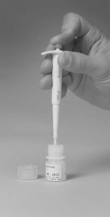 Depress the plunger button on the top to the first stop (see photo at left). DO NOT depress all the way to the pipette body. 3. Immerse the clean tip into the solution to be withdrawn.