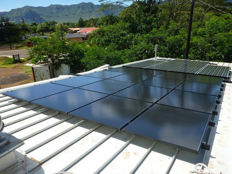 Figure 3. Kawaikini East classroom, East Kauai, showing two PV systems both connected in string configuration, CIGS (top) and monocrystalline (bottom).