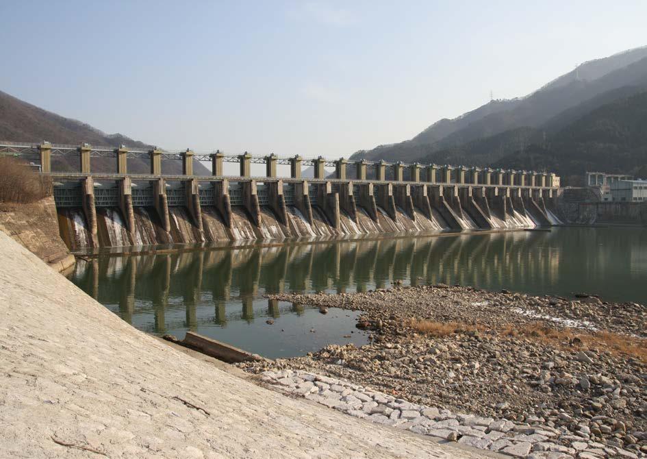 As shown in Figure, Cheongpyeong Dam is a concrete gravity dam measuring 31.0 m in height, 407.0 m in length and 50,000 m 3 in capacity. Elevations at the top of the dam and of spillway are EL. 53.