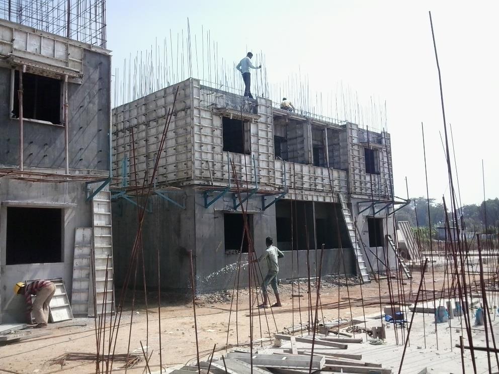 SHEAR WALL / MONOLITHIC CONSTRUCTION USING ALUMINUM SHUTTERING Methodology: The elements like walls, beams and slabs made of RCC are cast together at one go by using aluminum form work.