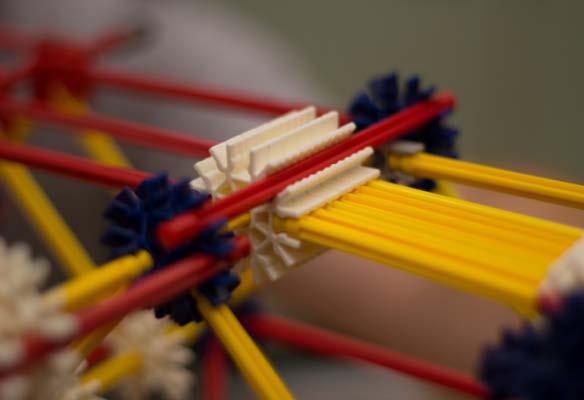 The connection designs were particularly critical because K nex toys were not intended to suspend blocks of concrete.