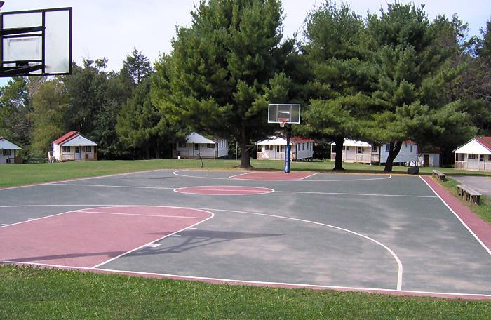 VI. BASKETBALL COURTS A. Surfacing 1. Surface is smooth, level, and well drained with no standing water. 2.
