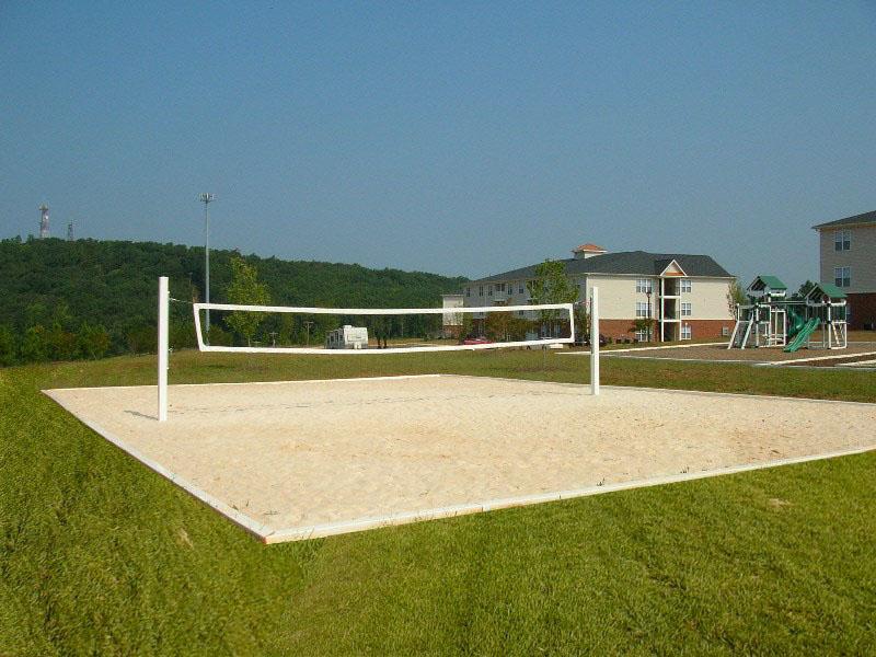 Support poles to have hardware intact, properly anchored and installed. 1. Court surface is loose sand. 2.
