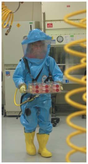 Figure 9.4 A BSL-4 worker carrying Ebola virus cultures.