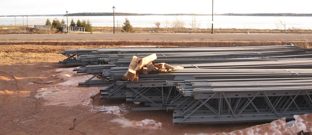 JOIST ARE STORED ON SITE OR LIFTED DIRECTLY FROM TRUCK LAYING THE JOISTS DOWN ON SITE MEANS