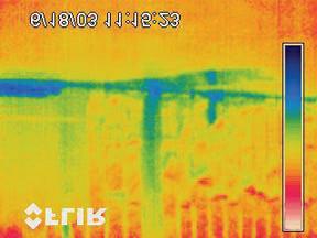 This thermogram shows water and moisture remaining from sprinklers that were activated during a fire that was knocked down about 11 hours earlier.